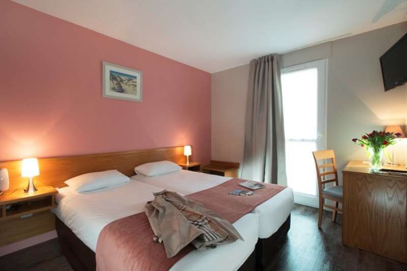 Brit Hotel Les Alizes Порнік Номер фото
